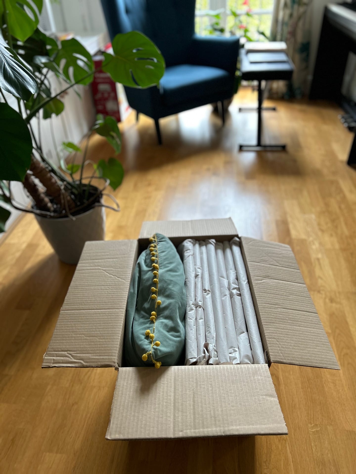 Mover handling protected sofa
